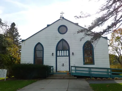 The former (second) All Saints church located next to the parish center.