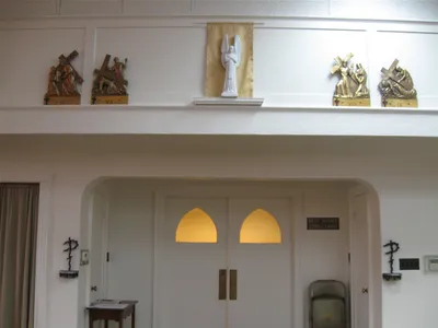 Stations of the cross along back wall.