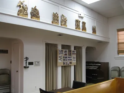 Stations of the cross along back wall.