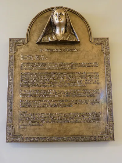 St. Bernadette plaque.