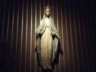 Statue of Our Lady on left side wall.