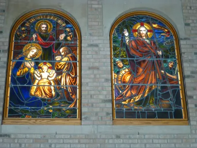 Stained glass above entrance to church.
