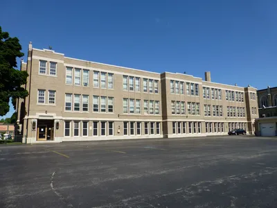 Former school seen from parking lot.
