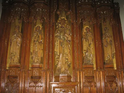 According to parish history: Statues of King David (not sure if that's correct), Archangel Gabriel, St. Joseph, Archangel Michael, Jacob.