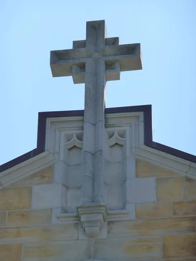 Cross atop church.