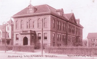Exterior of original church/school. Source: A Celebration of 100 Years - Church of the Blessed Sacrament, 1901-2001