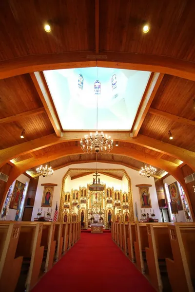 Left side of the church.