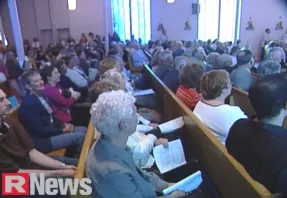 Screenshot from news coverage of the final Mass. Source: RNews
