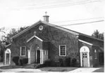 Former appearance of exterior. Source: Our Lady of Good Counsel Web site (defunct)
