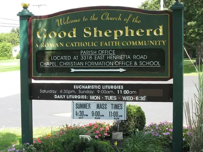 Former church sign, prior to parish merger.