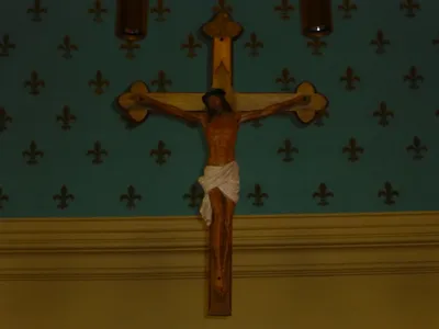 Crucifix above sanctuary.