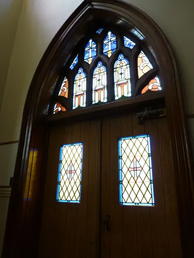 Door and stained glass, front entrance.
