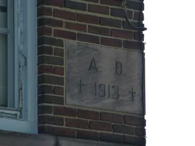 Cornerstone on school building.