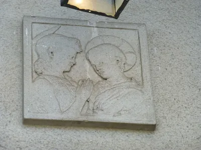 Relief above one of the entrances on the front.