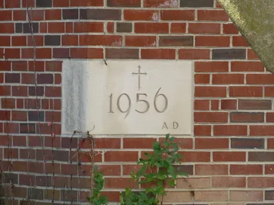 Cornerstone on the building behind the church.