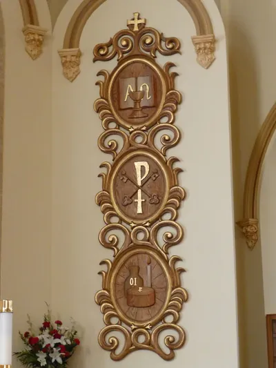 Sacramental reliefs to the right of the crucifix.