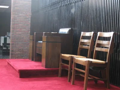 Celebrant and servers' chairs.