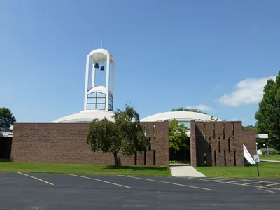 Left side of church.