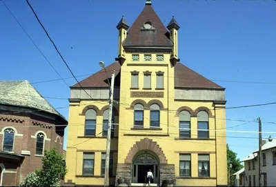 Photograph of Concordia Hall, which is still located behind the church. 1986? Source: Rochester Public Library.