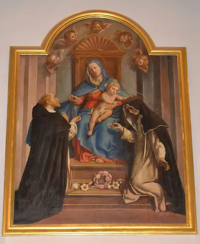 Our Lady of the Holy Rosary painting that hung atop the high altar, by E. Toschi.