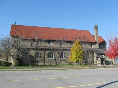 Left side of the church.