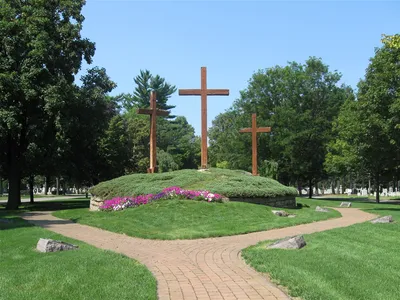 Wooden crosses near Lake Ave entrance.