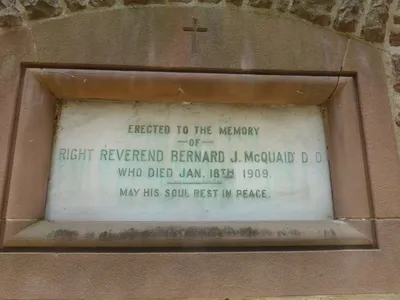Dedication plaque commemorating Bp. McQuaid.