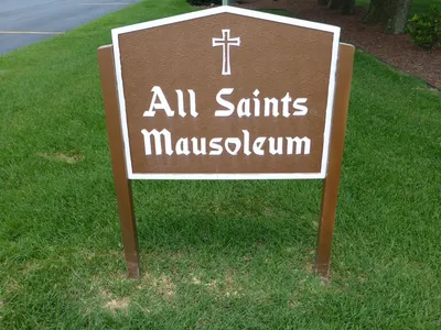 Sign outside mausoleum.