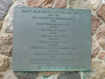 Plaque next to St. Elizabeth relief.