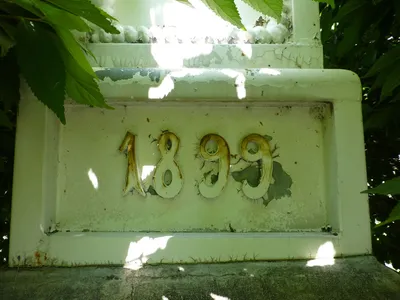 Date on base of large cross in cemetery.