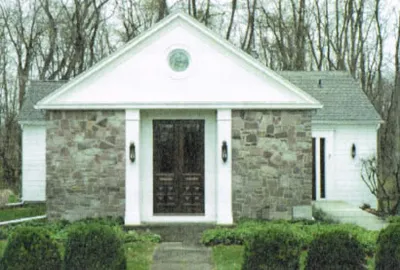 Exterior before the church was sold. Source: St. John of Rochester: Five Decades of Grace & Growth