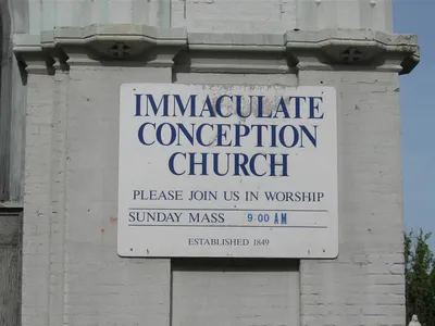 Sign on the church.
