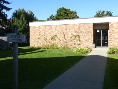 Rogers Hall behind the church.