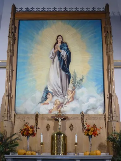 Immaculate Conception painting atop high altar.