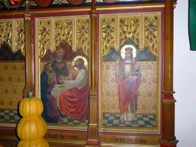 Reredo with paintings depicting various titles for Christ.