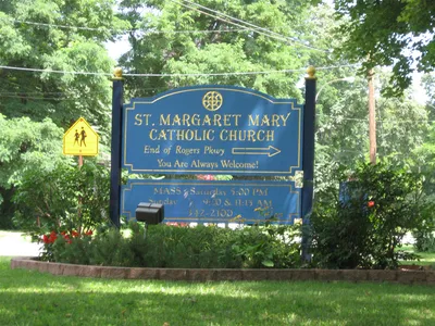 Former church sign at corner of Rogers Parkway and St. Paul Blvd.
