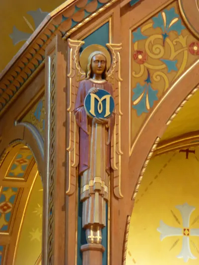 Angel statue in baldacchino.
