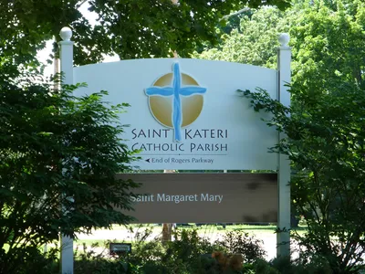 Present church sign at corner of Rogers Parkway and St. Paul Blvd.