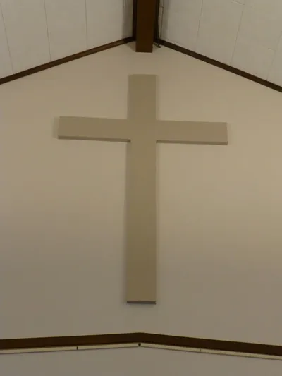 Cross on wall.