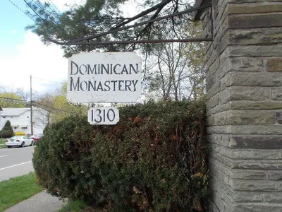 Monastery sign. Source: Realty USA