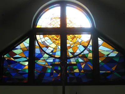 Stained glass in sanctuary.