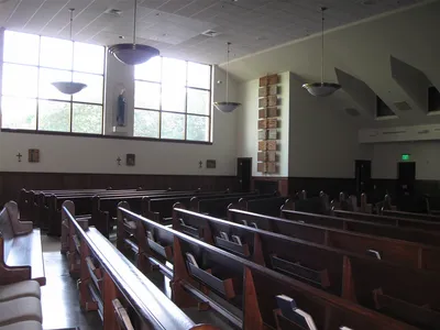 Left side of church.