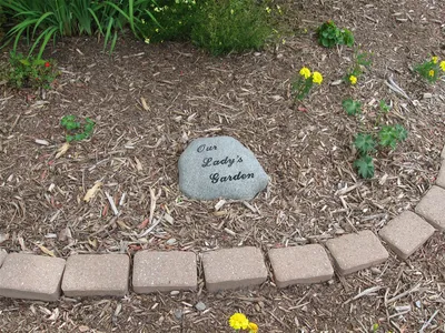 Our Lady's Garden inscription on rock.