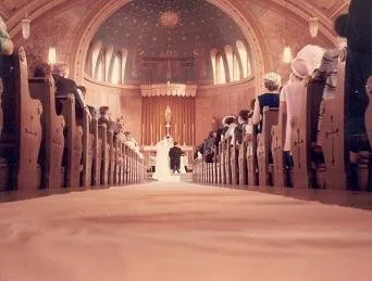 Interior photograph from a wedding, 1968. Note the minor changes to the sanctuary compared to previous image. A small fire had damaged the altar area. Source: On Facebook, former parishioner