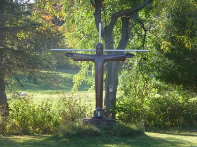 Crucifix behind chapel.