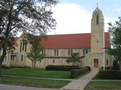Left side of the church.