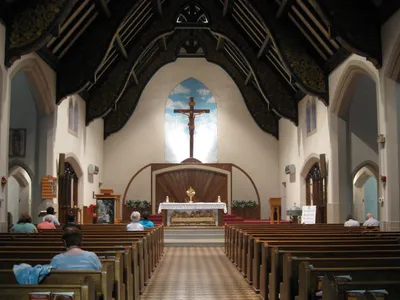 Interior before the backlit stained glass atop the sanctuary was uncovered.
