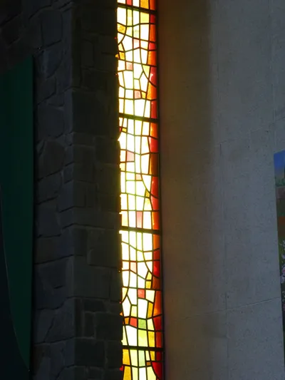 Stained glass in sanctuary.