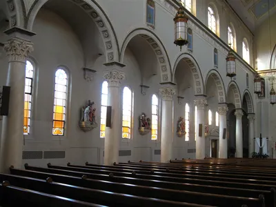 Left side of the church.