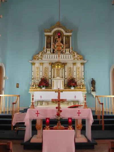 Cross atop church.